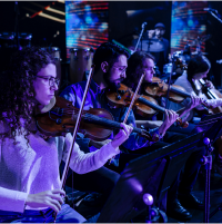 Group of people playing violins